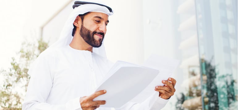 Man with business loan documents